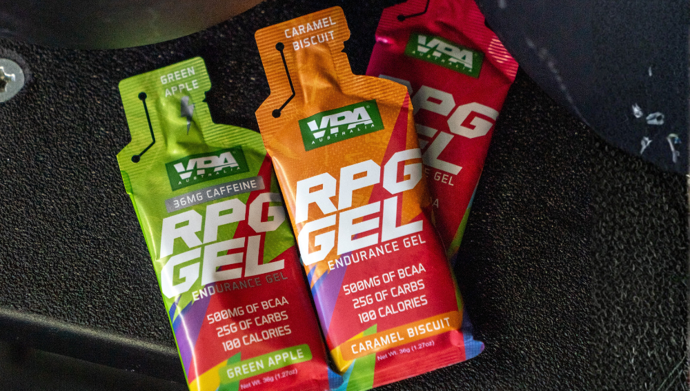 Three packets of RPG Gel in green, orange, and red colors.